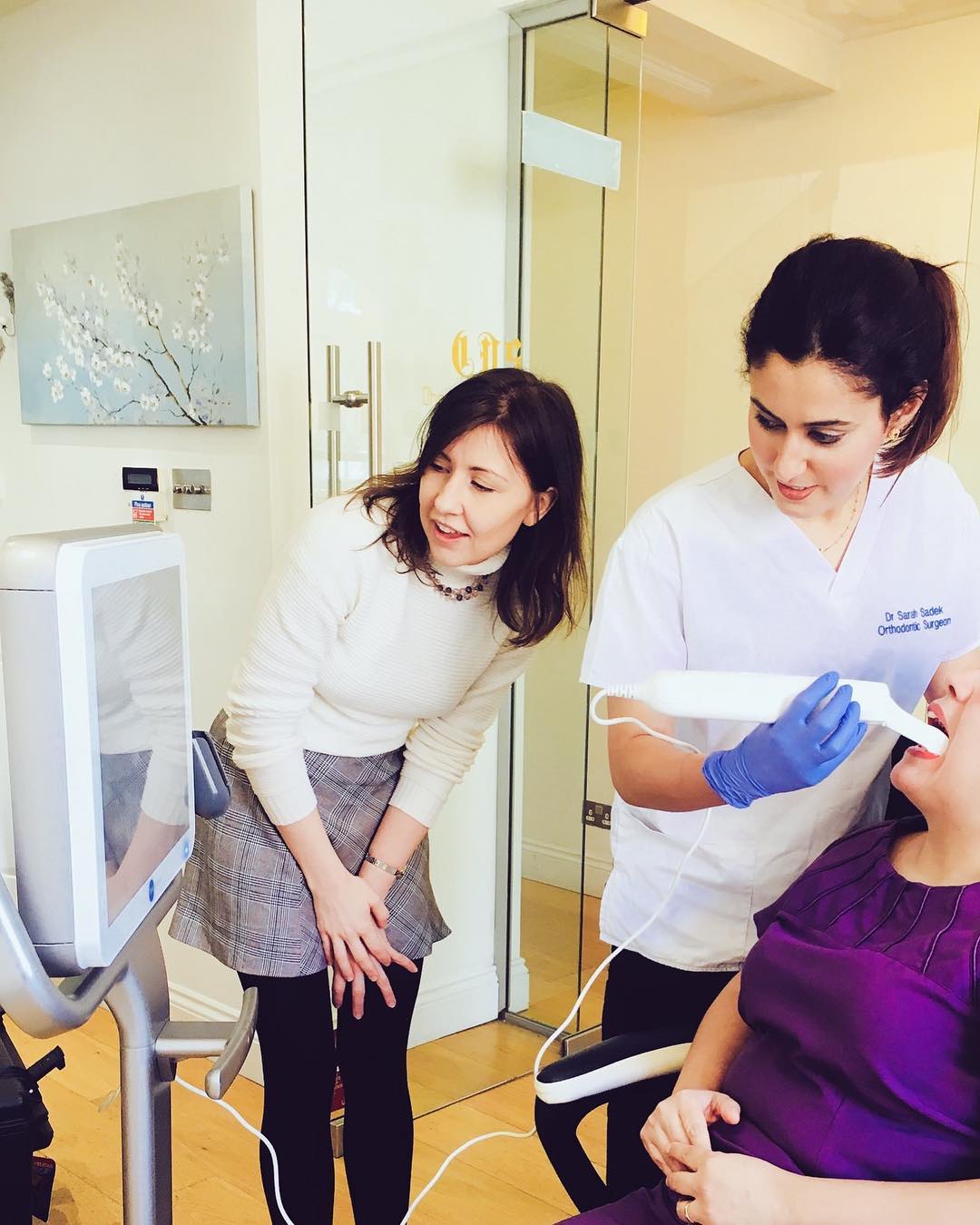 Dr Sarah Sadek with a patient at SW3 Dental